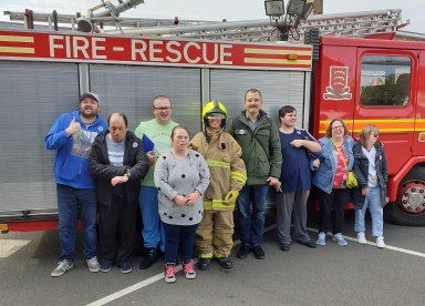 Customers in front of a fire engine