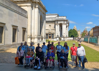 Customers in front of a big building